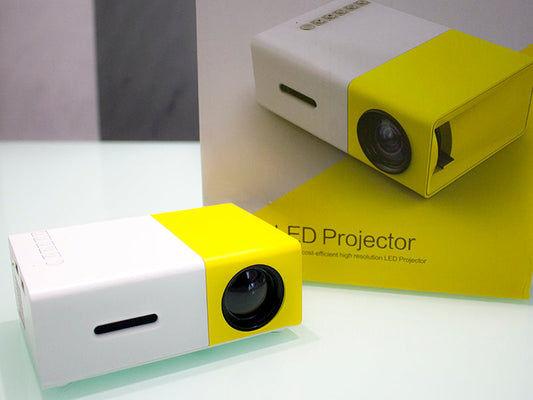 Mini Proyector Portatil - Pantalla de cine en cualquier lugar.